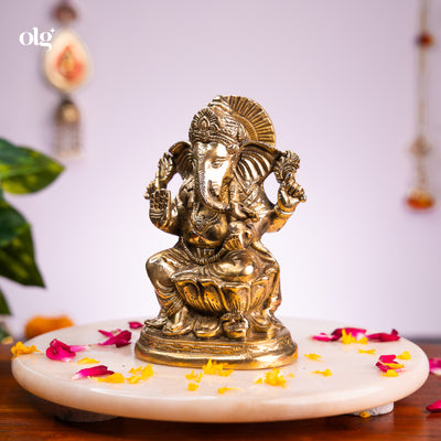 Antique brass Ganesha idol seated on lotus base, 7 inch, handcrafted