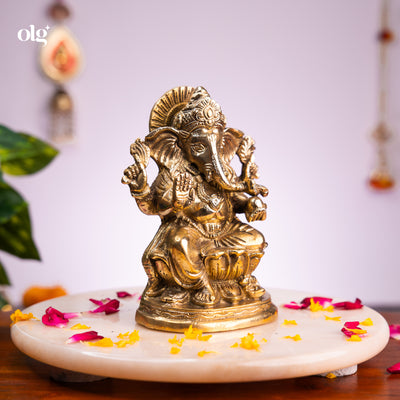 Antique brass Ganesha idol seated on lotus base, 7 inch, handcrafted