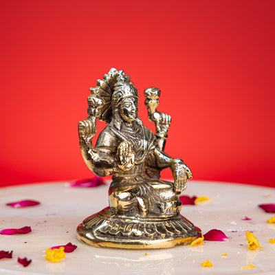 Brass seated Goddess Lakshmi idol on lotus, 4 inch, handcrafted