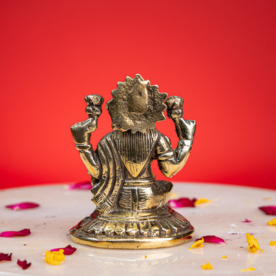 Brass seated Goddess Lakshmi idol on lotus, 4 inch, handcrafted