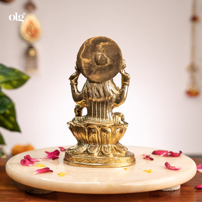 Brass seated Goddess Lakshmi idol on lotus, 7 inch, handcrafted