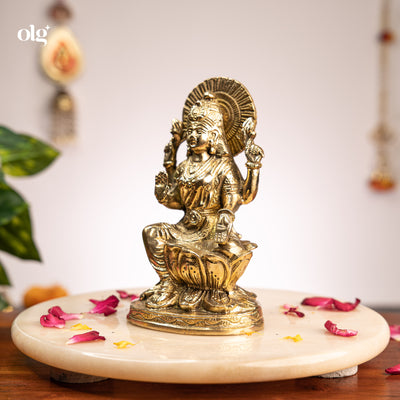 Brass seated Goddess Lakshmi idol on lotus, 7 inch, handcrafted