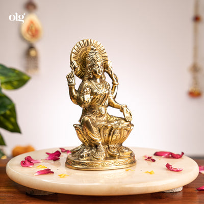 Brass seated Goddess Lakshmi idol on lotus, 7 inch, handcrafted