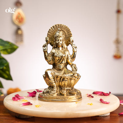 Brass seated Goddess Lakshmi idol on lotus, 7 inch, handcrafted