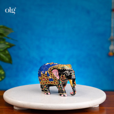 Hand-painted black and blue wooden elephant figurine with mosaic inlay
