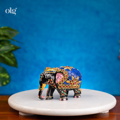 Hand-painted black and blue wooden elephant figurine with mosaic inlay