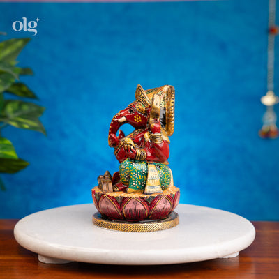 Hand-painted colorful kadam wood Ganesha idol on lotus base, 6 inch