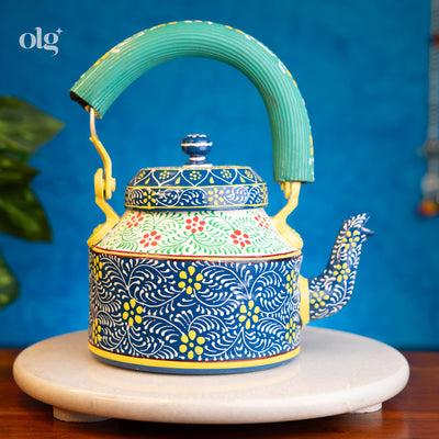 Hand-painted aluminium Indian kettle and glass tea set