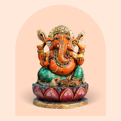 Hand-painted orange and green kadam wood Ganesha idol