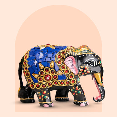 Hand-painted black and blue wooden elephant figurine with mosaic inlay