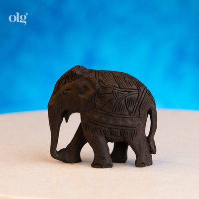 Hand-carved dark wood elephant figurine, 2 inch, plain natural finish