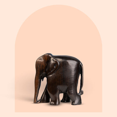 Hand-carved dark ebony wood elephant figurine, 4 inch, natural finish