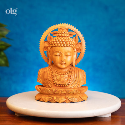 Hand-carved wooden Buddha bust with carved halo