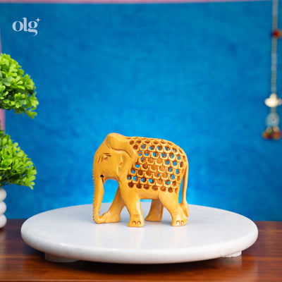 Hand-carved wooden elephant figurine with jali lattice design, 4 inch