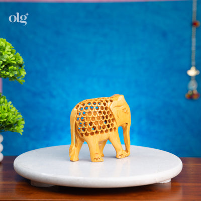 Hand-carved wooden elephant figurine with jali lattice design, 4 inch