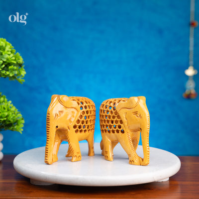 Set of two hand-carved wooden elephant figurines, 4 inch each