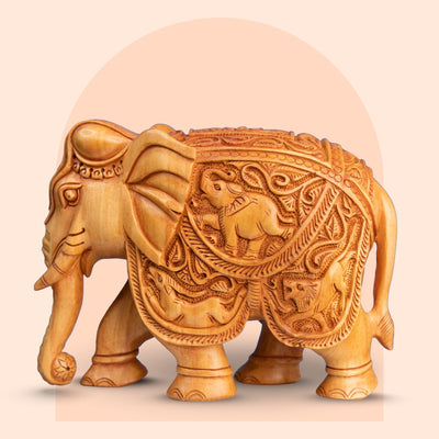 Hand-carved wooden elephant figurine with Rajasthani carving, 6 inch