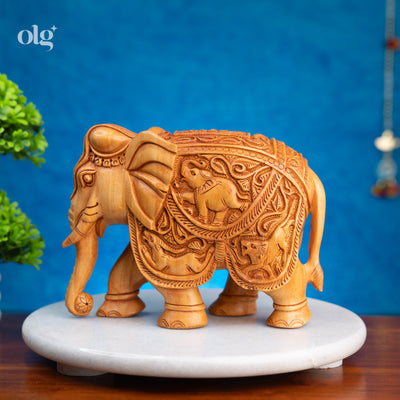 Hand-carved wooden elephant figurine with Rajasthani carving, 6 inch