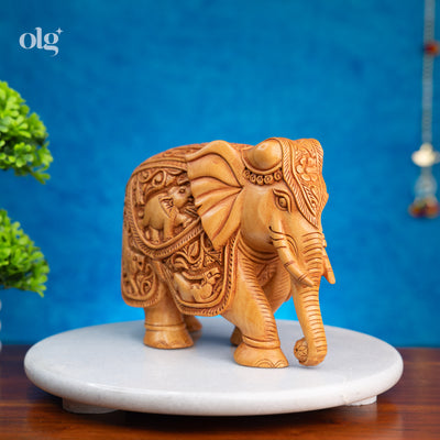 Hand-carved wooden elephant figurine with Rajasthani carving, 6 inch