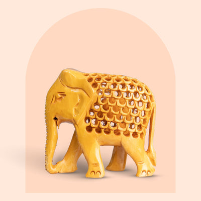 Hand-carved wooden elephant figurine with jali lattice design, 4 inch