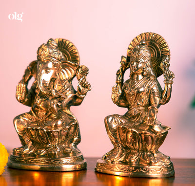 Brass Lakshmi and Ganesha idol pair on lotus bases, 7 inch each, antique finish