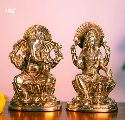 Brass Lakshmi and Ganesha idol pair on lotus bases, 7 inch each, antique finish
