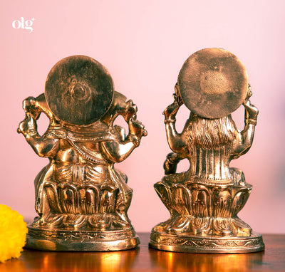 Brass Lakshmi and Ganesha idol pair on lotus bases, 7 inch each, antique finish