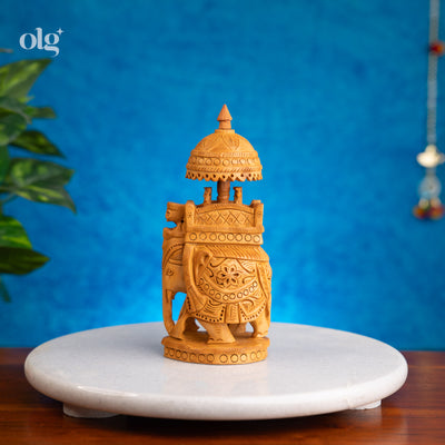 Hand-carved kadam wood elephant figurine with ambari howdah, 7 inch
