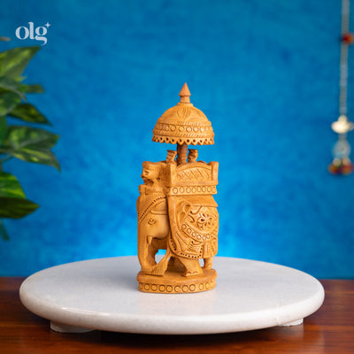 Hand-carved kadam wood elephant figurine with ambari howdah, 7 inch