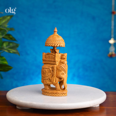 Hand-carved kadam wood elephant figurine with ambari howdah, 7 inch