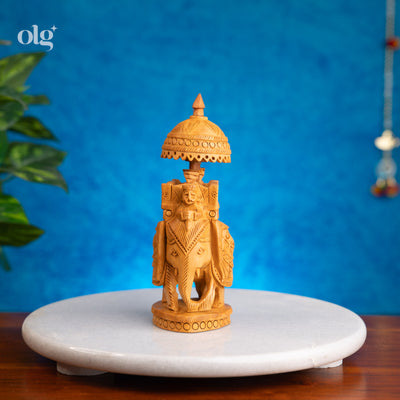 Hand-carved kadam wood elephant figurine with ambari howdah, 7 inch