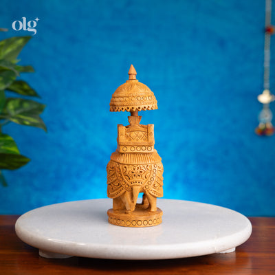 Hand-carved kadam wood elephant figurine with ambari howdah, 7 inch