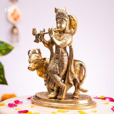 Brass Krishna idol playing flute beside a cow, 8 inch, handcrafted murti