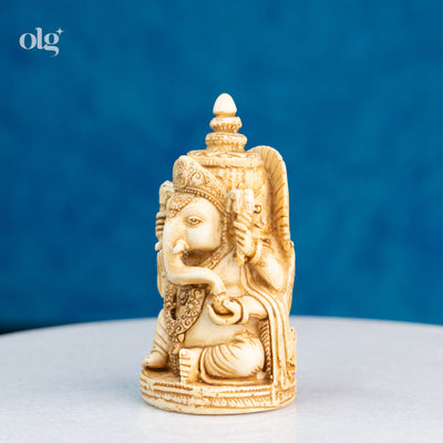 Cultured marble Ganesha idol, antique ivory finish, 4 inch