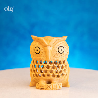 Miniature hand-carved wooden owl figurine with jali lattice work