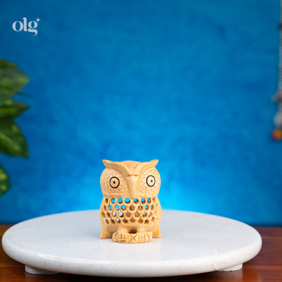 Miniature hand-carved wooden owl figurine with jali lattice work