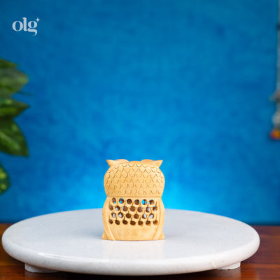 Miniature hand-carved wooden owl figurine with jali lattice work