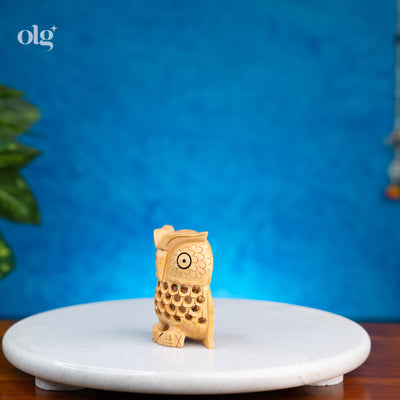 Miniature hand-carved wooden owl figurine with jali lattice work