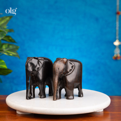 Set of two polished ebony wood elephant statues