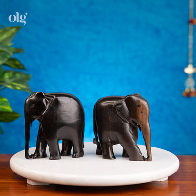 Set of two polished ebony wood elephant statues