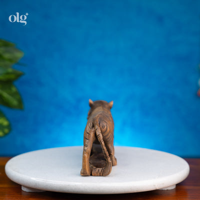 Hand-carved wooden tiger sculpture, naturalistic wildlife art