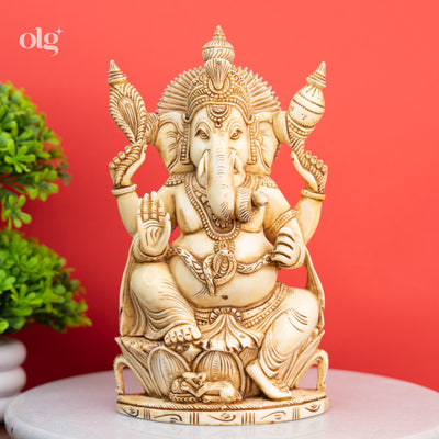 Cultured marble seated Ganesha statue, antique ivory finish