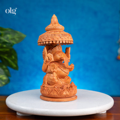 Hand-carved wooden Ganesha statue with chhatri canopy, 8 inch